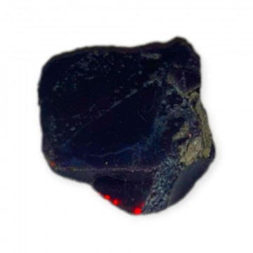 Opal, svart fra Etiopia Rå 0,46 gram AAA-kvalitet