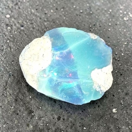 Opal, svart fra Etiopia Rå 1,27 gram AAA-kvalitet